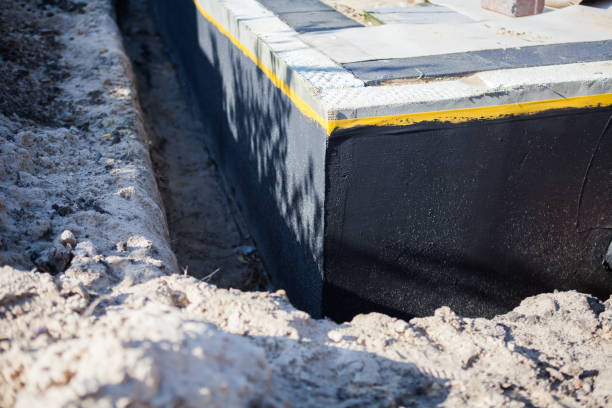 Professional Emergency Waterproofing technician working in Ravenna, OH